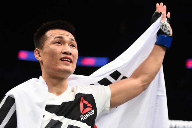 HOUSTON, TX - FEBRUARY 04:  Chan Sung Jung of South Korea celebrates his victory over Dennis Bermudez in their featherweight bout during the UFC Fight Night event at the Toyota Center on February 4, 2017 in Houston, Texas. (Photo by Jeff Bottari/Zuffa LLC/Zuffa LLC via Getty Images)
