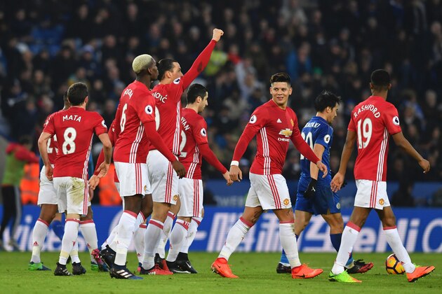 Manchester United's Swedish striker Zlatan Ibrahimovic (C) celebrates with teammates after scoring their second goal of the English Premier League football match between Leicester City and Manchester United at King Power Stadium in Leicester, central England on February 5, 2017. / AFP / Ben STANSALL / RESTRICTED TO EDITORIAL USE. No use with unauthorized audio, video, data, fixture lists, club/league logos or 'live' services. Online in-match use limited to 75 images, no video emulation. No use in betting, games or single club/league/player publications.  /         (Photo credit should read BEN STANSALL/AFP/Getty Images)