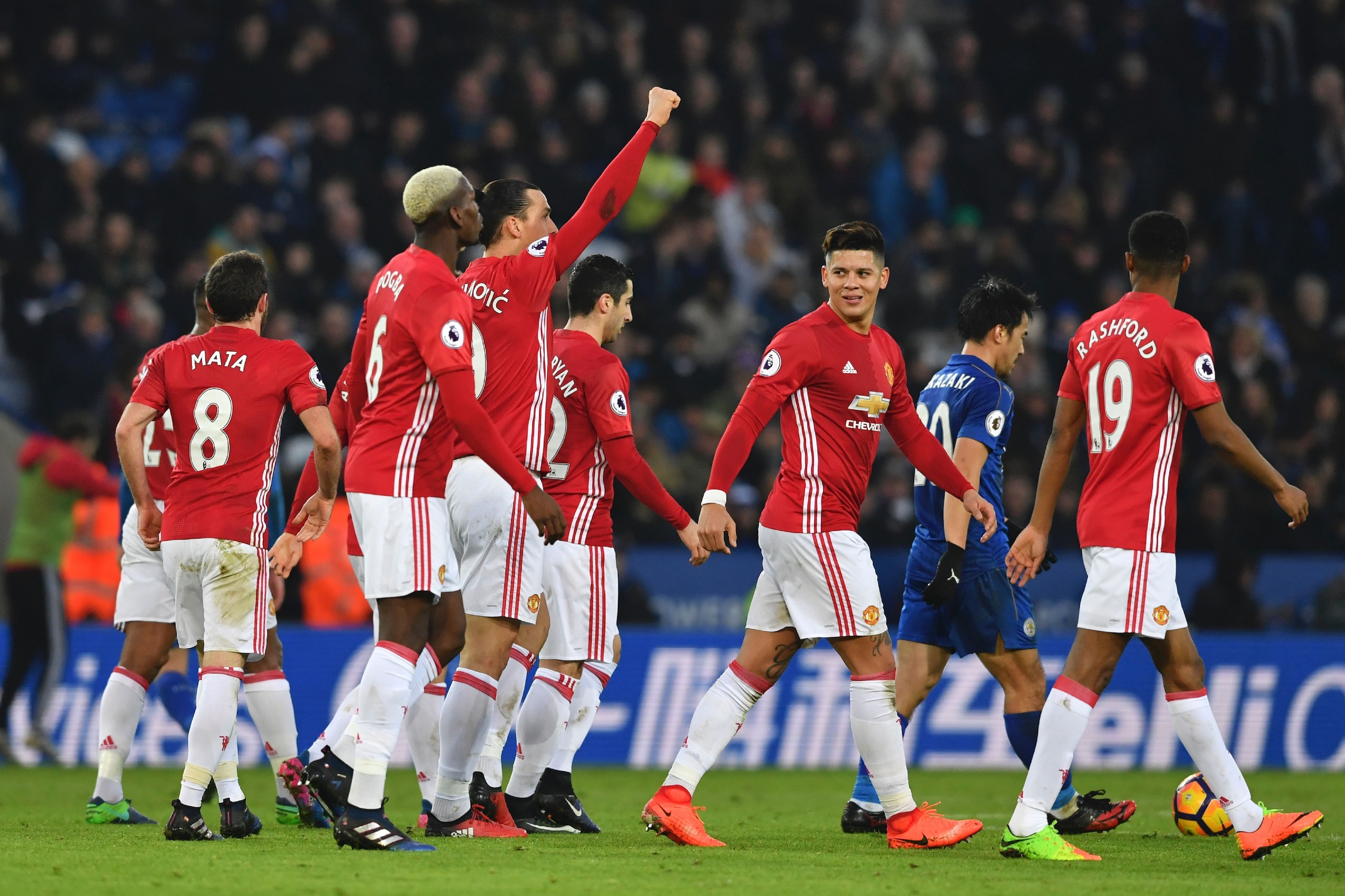 Manchester United's Swedish striker Zlatan Ibrahimovic (C) celebrates with teammates after scoring their second goal of the English Premier League football match between Leicester City and Manchester United at King Power Stadium in Leicester, central England on February 5, 2017. / AFP / Ben STANSALL / RESTRICTED TO EDITORIAL USE. No use with unauthorized audio, video, data, fixture lists, club/league logos or 'live' services. Online in-match use limited to 75 images, no video emulation. No use in betting, games or single club/league/player publications.  /         (Photo credit should read BEN STANSALL/AFP/Getty Images)