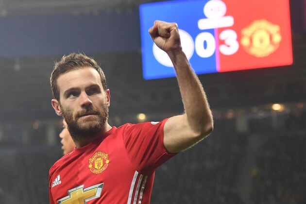 Manchester United's Spanish midfielder Juan Mata celebrates after scoring their third goal during the English Premier League football match between Leicester City and Manchester United at King Power Stadium in Leicester, central England on February 5, 2017. / AFP / Ben STANSALL / RESTRICTED TO EDITORIAL USE. No use with unauthorized audio, video, data, fixture lists, club/league logos or 'live' services. Online in-match use limited to 75 images, no video emulation. No use in betting, games or single club/league/player publications.  /         (Photo credit should read BEN STANSALL/AFP/Getty Images)