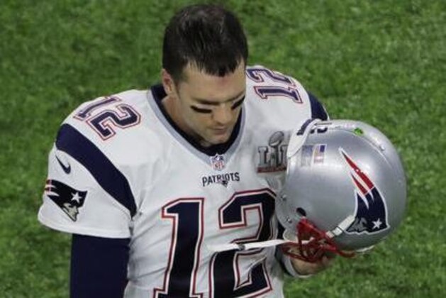 New England Patriots' Tom Brady walks off the field at the end of the first half of the NFL Super Bowl 51 football game against the Atlanta Falcons, Sunday, Feb. 5, 2017, in Houston. (AP Photo/Charlie Riedel)