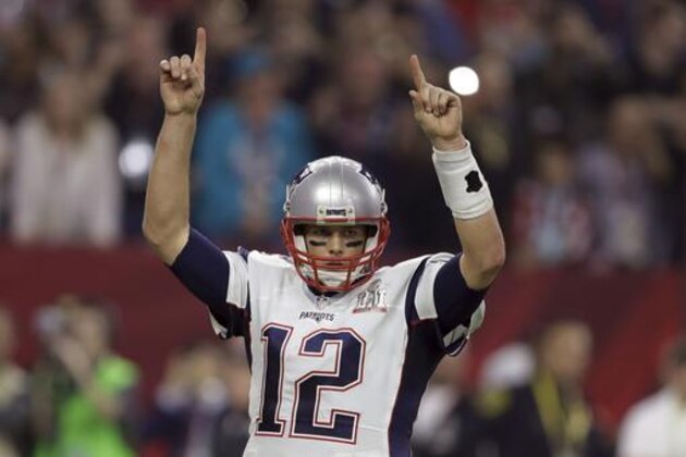 New England Patriots' Tom Brady raises his arms after a touchdown, during the second half of the NFL Super Bowl 51 football game against the Atlanta Falcons, Sunday, Feb. 5, 2017, in Houston. (AP Photo/Darron Cummings)