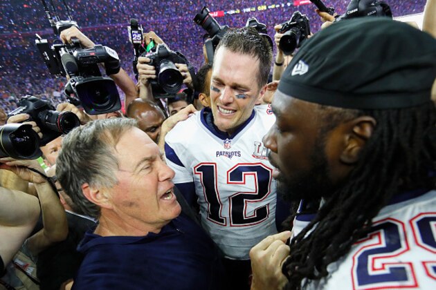 HOUSTON, TX - FEBRUARY 05:  Head coach Bill Belichick, Tom Brady #12 and LeGarrette Blount #29 of the New England Patriots celebrate after defeating the Atlanta Falcons during Super Bowl 51 at NRG Stadium on February 5, 2017 in Houston, Texas. The Patriots defeated the Falcons 34-28.  (Photo by Kevin C. Cox/Getty Images)