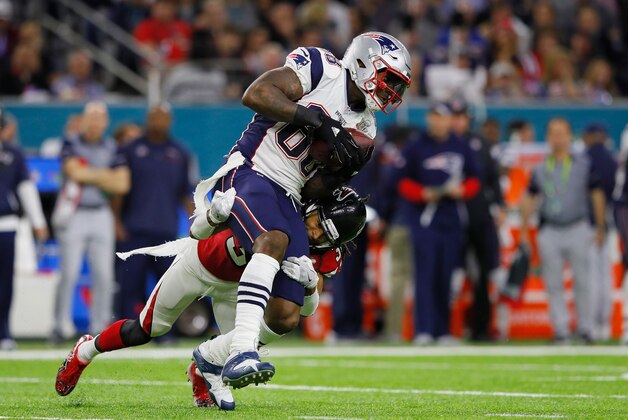 HOUSTON, TX - FEBRUARY 05:  Martellus Bennett #88 of the New England Patriots makes a catch against Deji Olatoye #30 of the Atlanta Falcons in the second quarter during Super Bowl 51 at NRG Stadium on February 5, 2017 in Houston, Texas.  (Photo by Kevin C. Cox/Getty Images)