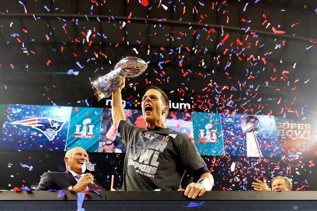 HOUSTON, TX - FEBRUARY 05:  Tom Brady #12 of the New England Patriots celebreates with the Vince Lombardi Trophy after defeating the Atlanta Falcons during Super Bowl 51 at NRG Stadium on February 5, 2017 in Houston, Texas. The Patriots defeated the Falcons 34-28.  (Photo by Kevin C. Cox/Getty Images)