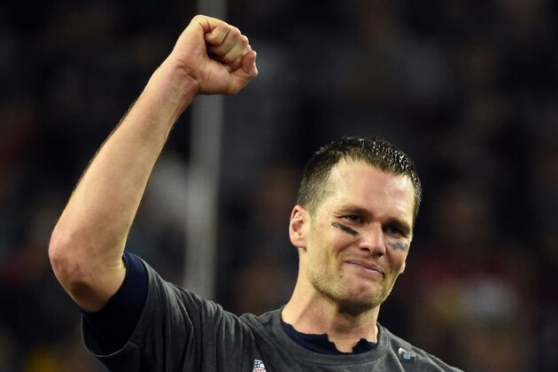 Tom Brady #12 of the New England Patriots celebrates after defeating the Atlanta Falcons 34-28 in overtime during Super Bowl 51 at NRG Stadium on February 5, 2017 in Houston, Texas. / AFP / Timothy A. CLARY        (Photo credit should read TIMOTHY A. CLARY/AFP/Getty Images)