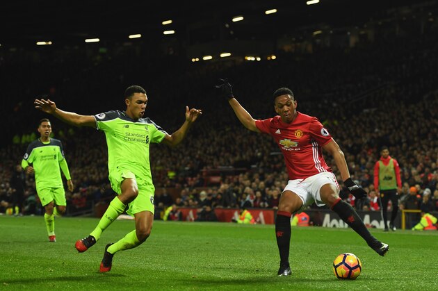 MANCHESTER, ENGLAND - JANUARY 15:  Anthony Martial of Manchester United is faced by Trent Alexander-Arnold of Liverpool during the Premier League match between Manchester United and Liverpool at Old Trafford on January 15, 2017 in Manchester, England.  (Photo by Mike Hewitt/Getty Images)