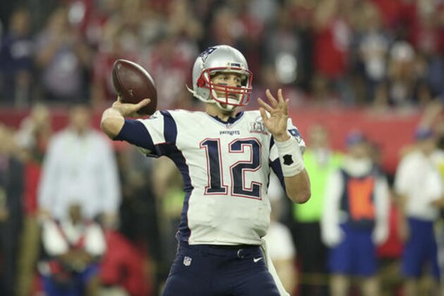 New England Patriots QB Tom Brady #12 throws a pass against the Atlanta Falcons in the NFL Super Bowl on Sunday, February 5, 2017 in Houston, TX. (AP Photo/Gregory Payan)