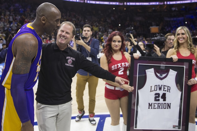PHILADELPHIA, PA - DECEMBER 1: Kobe Bryant #24 of the Los Angeles Lakers and his Lower Merion high school coach Gregg Downer share a moment prior to the game against the Philadelphia 76ers on December 1, 2015 at the Wells Fargo Center in Philadelphia, Pennsylvania. NOTE TO USER: User expressly acknowledges and agrees that, by downloading and or using this photograph, User is consenting to the terms and conditions of the Getty Images License Agreement. (Photo by Mitchell Leff/Getty Images)
