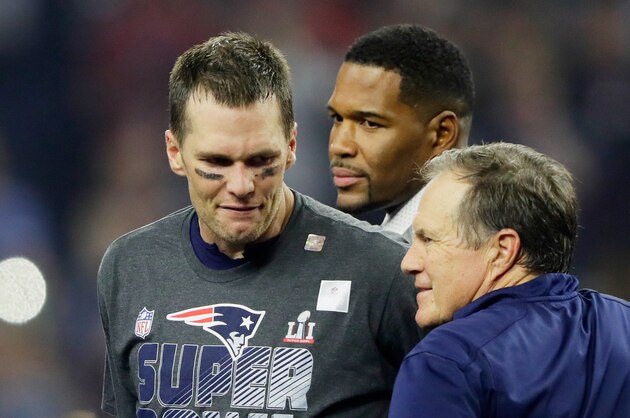 HOUSTON, TX - FEBRUARY 05:  Tom Brady #12 of the New England Patriots reacts with head coach Bill Belichick after defeating the Atlanta Falcons 34-28 in overtime to win Super Bowl 51 at NRG Stadium on February 5, 2017 in Houston, Texas.  (Photo by Jamie Squire/Getty Images)