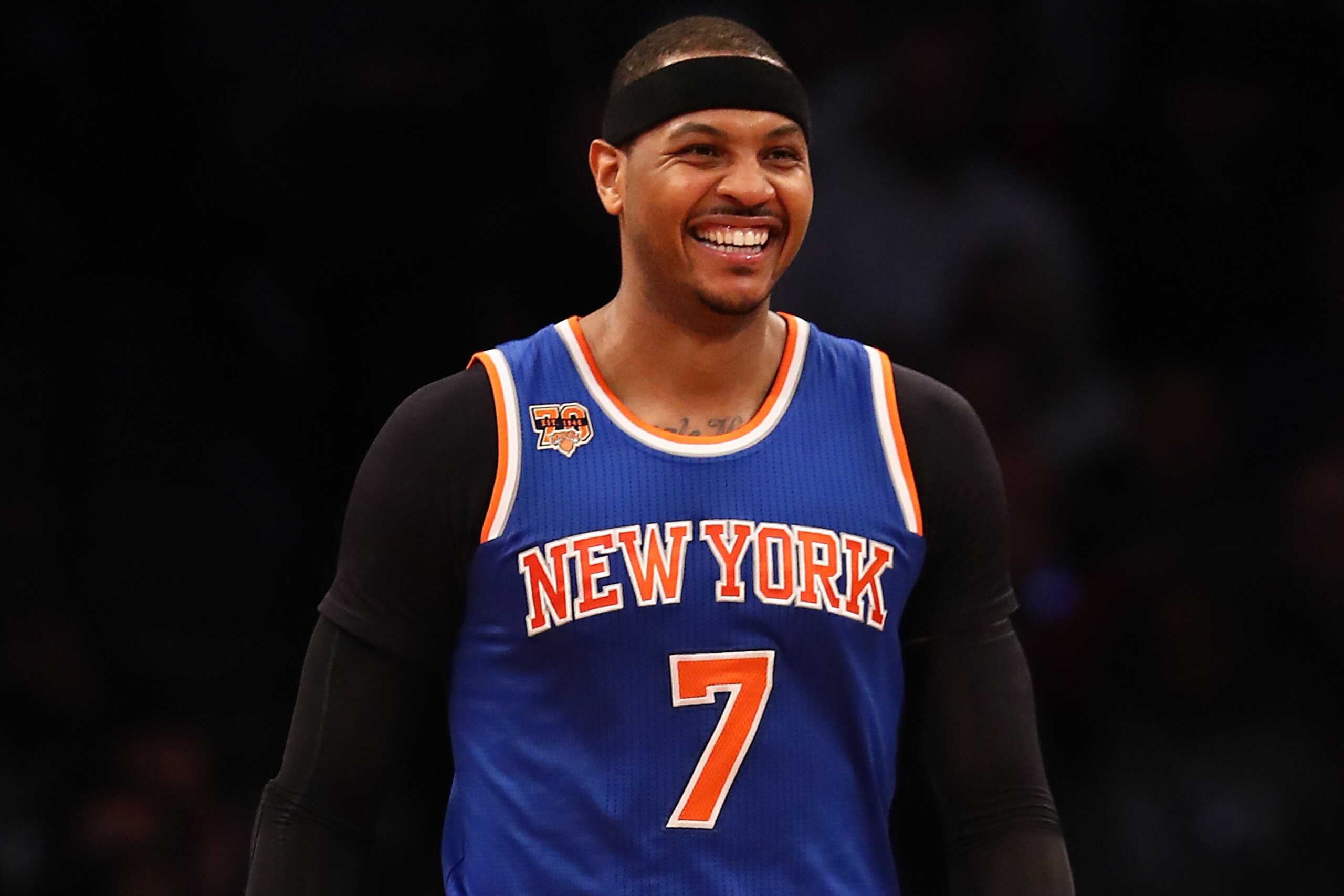 NEW YORK, NY - FEBRUARY 01:  Carmelo Anthony #7 of the New York Knicks reacts against the Brooklyn Nets during their game at the Barclays Center on February 1, 2017 in New York City.  NOTE TO USER: User expressly acknowledges and agrees that, by downloading and/or using this Photograph, user is consenting to the terms and conditions of the Getty Images License Agreement.  (Photo by Al Bello/Getty Images)