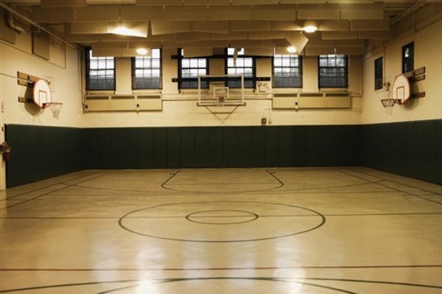 Empty basketball court (Blend Images via AP Images)