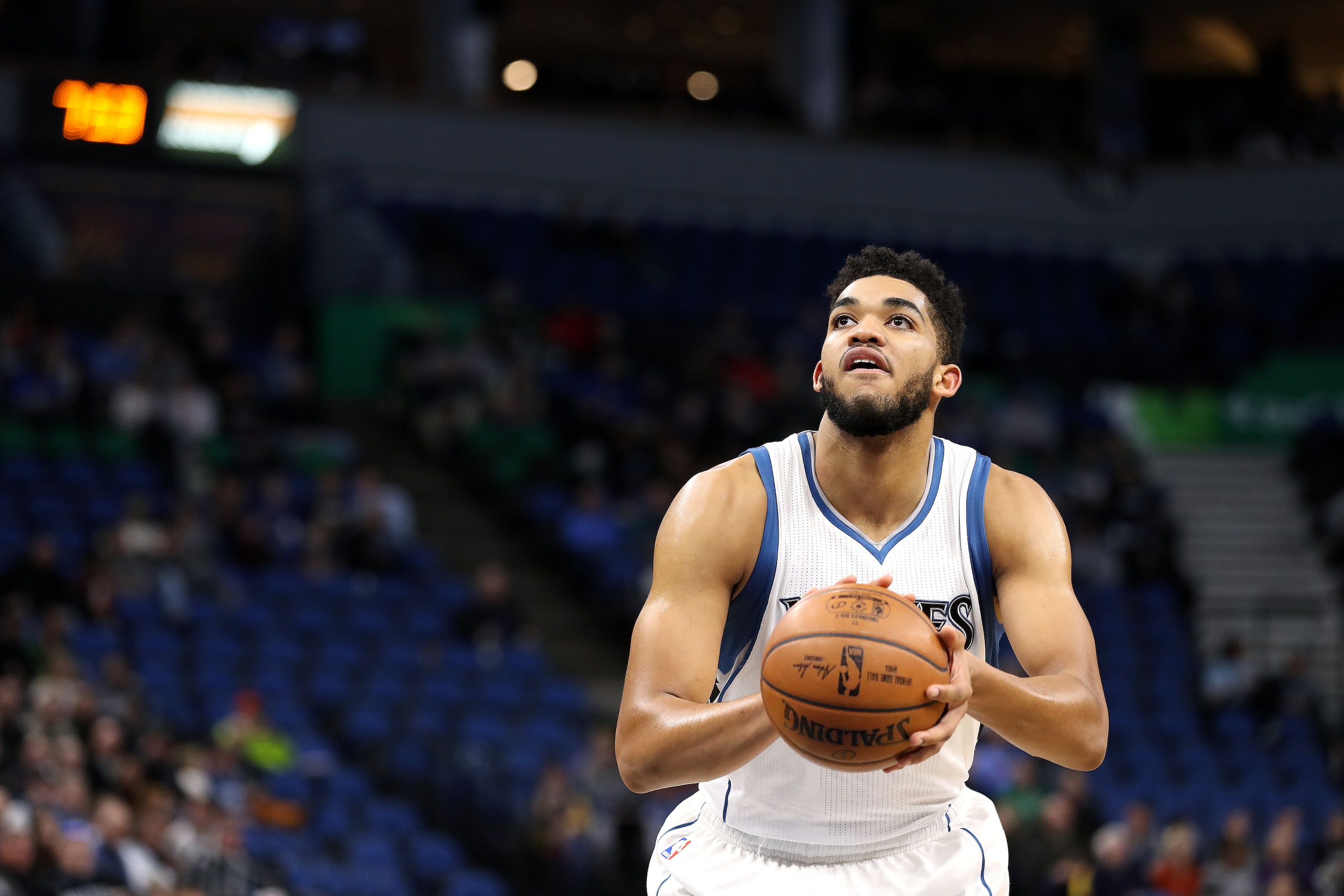 MINNEAPOLIS, MN -  JANUARY 30: Karl-Anthony Towns #32 of the Minnesota Timberwolves shoots a free throw during the game against the Orlando Magic on January 30, 2017 at Target Center in Minneapolis, Minnesota. NOTE TO USER: User expressly acknowledges and agrees that, by downloading and or using this Photograph, user is consenting to the terms and conditions of the Getty Images License Agreement. Mandatory Copyright Notice: Copyright 2017 NBAE (Photo by Jordan Johnson/NBAE via Getty Images)