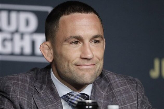 Frankie Edgar attends a UFC 200 mixed martial arts news conference, Wednesday, July 6, 2016, in Las Vegas. UFC 200 is scheduled for Saturday in Las Vegas. (AP Photo/John Locher)