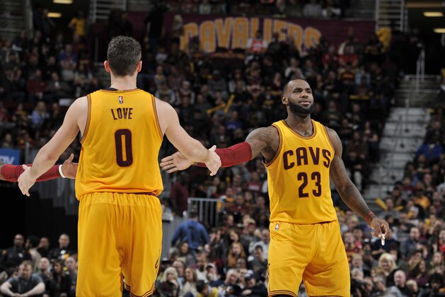 CLEVELAND, OH - NOVEMBER 25: Kevin Love #0 and LeBron James #23 of the Cleveland Cavaliers celebrates against the Dallas Mavericks on November 25, 2016 at Quicken Loans Arena in Cleveland, Ohio.  NOTE TO USER: User expressly acknowledges and agrees that, by downloading and or using this Photograph, user is consenting to the terms and conditions of the Getty Images License Agreement. Mandatory Copyright Notice: Copyright 2016 NBAE (Photo by David Liam Kyle/NBAE via Getty Images)