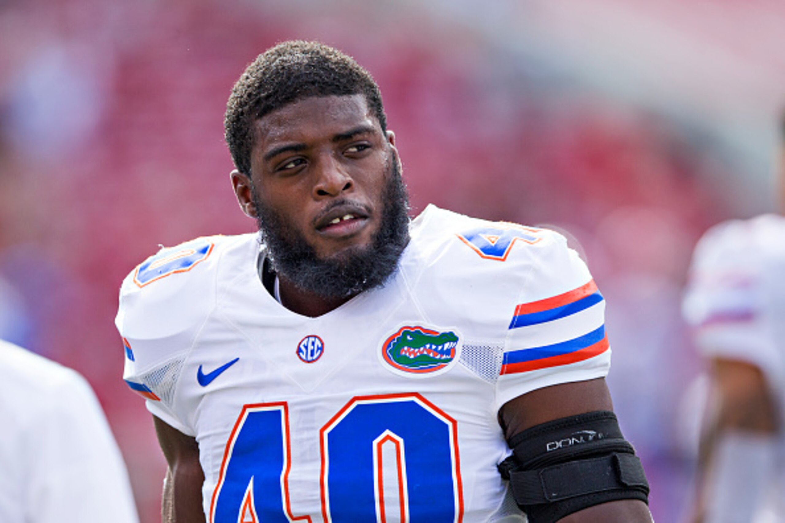 FAYETTEVILLE, AR - NOVEMBER 5:  Jarrad Davis #40 of the Florida Gators warming up before a game against the Arkansas Razorbacks at Razorback Stadium on November 5, 2016 in Fayetteville, Arkansas.  The Razorbacks defeated the Gators 31-10.  (Photo by Wesley Hitt/Getty Images)