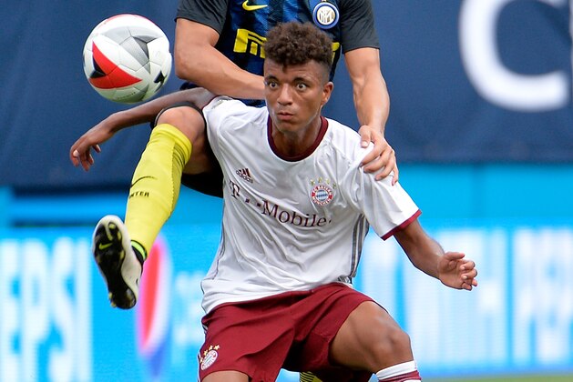 CHARLOTTE, NC - JULY 30:  Danilo D'Ambrosio #33 of FC Internazionale challenges Timothy Tillman #16 of FC Bayern Munich for the ball during an International Champions Cup match at Bank of America Stadium on July 30, 2016 in Charlotte, North Carolina. FC Bayern Munich defeated FC Internazionale, 4-1.  (Photo by Grant Halverson/Getty Images)