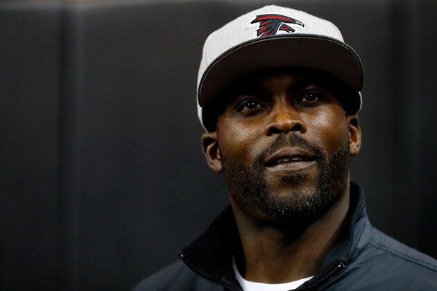 ATLANTA, GA - JANUARY 01: Former Atlanta Falcons player Michael Vick walks on the field prior to the game against the New Orleans Saints at the Georgia Dome on January 1, 2017 in Atlanta, Georgia. (Photo by Kevin C.  Cox/Getty Images)