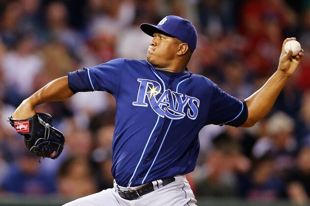 BOSTON, MA - AUGUST 30:  Enny Romero #45 of the Tampa Bay Rays pitches against the Boston Red Sox  during the seventh inning at Fenway Park on August 30, 2016 in Boston, Massachusetts.  (Photo by Maddie Meyer/Getty Images)