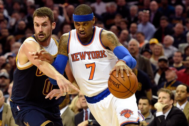 CLEVELAND, OH - OCTOBER 30: Carmelo Anthony #7 of the New York Knicks handles the ball against Kevin Love #0 of the Cleveland Cavaliers in the first quarter at Quicken Loans Arena on October 30, 2014 in Cleveland, Ohio. NOTE TO USER: User expressly acknowledges and agrees that, by downloading and or using this photograph, User is consenting to the terms and conditions of the Getty Images License Agreement.  (Photo by Jason Miller/Getty Images)