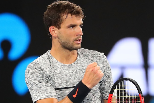 MELBOURNE, AUSTRALIA - JANUARY 27:  Grigor Dimitrov of Bulgaria reacts in his semifinal match against Rafael Nadal of Spain on day 12 of the 2017 Australian Open at Melbourne Park on January 27, 2017 in Melbourne, Australia.  (Photo by Scott Barbour/Getty Images)