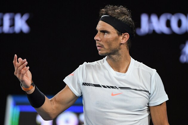 Spain's Rafael Nadal reacts after a point against Switzerland's Roger Federer during the men's singles final on day 14 of the Australian Open tennis tournament in Melbourne on January 29, 2017. / AFP / WILLIAM WEST / IMAGE RESTRICTED TO EDITORIAL USE - STRICTLY NO COMMERCIAL USE        (Photo credit should read WILLIAM WEST/AFP/Getty Images)