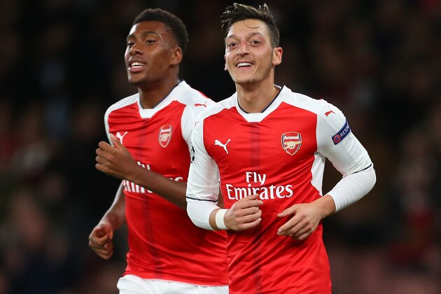 LONDON, ENGLAND - OCTOBER 19: Mesut Ozil of Arsenal and Alex Iwobi of Arsenal during the UEFA Champions League match between Arsenal FC and PFC Ludogorets Razgrad at Emirates Stadium on October 19, 2016 in London, England. (Photo by Catherine Ivill - AMA/Getty Images)