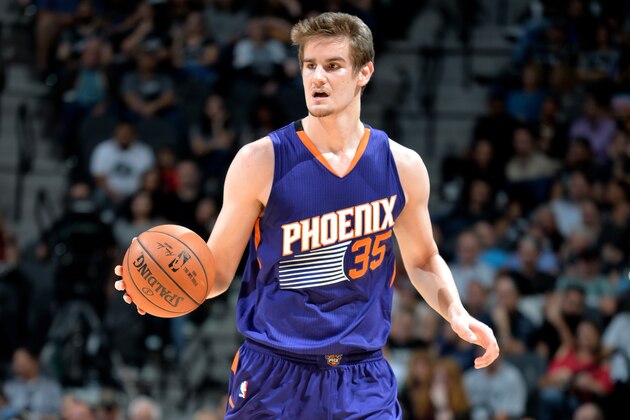 SAN ANTONIO, TX - DECEMBER 28: Dragan Bender #35 of the Phoenix Suns handles the ball during the game against the San Antonio Spurs on December 28, 2016 at the AT&T Center in San Antonio, Texas. NOTE TO USER: User expressly acknowledges and agrees that, by downloading and or using this photograph, user is consenting to the terms and conditions of the Getty Images License Agreement. Mandatory Copyright Notice: Copyright 2016 NBAE (Photos by Mark Sobhani/NBAE via Getty Images)