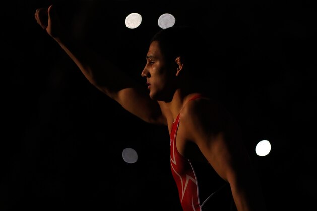 IOWA CITY, IOWA - APRIL 09:  Aaron Pico waves to the crowd as he is introduced prior to his Freestyle 65kg championship match against Frank Molinaro on day 1 of the Olympic Team Wrestling Trials at Carver-Hawkeye Arena on April 9, 2016 in Iowa City, Iowa.  (Photo by Jamie Squire/Getty Images)