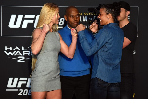 BROOKLYN, NY - FEBRUARY 08: (L-R) Holly Holm and Germaine de Randamie of The Netherlands face off during the UFC 208 Ultimate Media Day at the Barclays Center on February 8, 2017 in Brooklyn, New York. (Photo by Jeff Bottari/Zuffa LLC/Zuffa LLC via Getty Images)