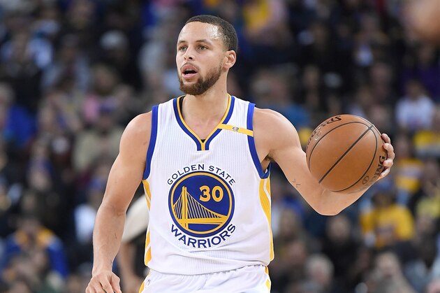 OAKLAND, CA - FEBRUARY 01:  Stephen Curry #30 of the Golden State Warriors dribbles the ball against the Charlotte Hornets during an NBA basketball game at ORACLE Arena on February 1, 2017 in Oakland, California. NOTE TO USER: User expressly acknowledges and agrees that, by downloading and or using this photograph, User is consenting to the terms and conditions of the Getty Images License Agreement.  (Photo by Thearon W. Henderson/Getty Images)
