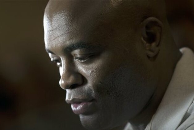 FILE -  In this April 22, 2015, file photo, mixed martial arts fighter Anderson Silva talks to reporters after a conference in Rio de Janeiro, Brazil. Nevada fight regulators imposed the maximum penalty Thursday, Aug. 13, 2015 on former UFC champion Silva for testing positive for steroid use in January 2015. Nevada Athletic Commission Chairman Francisco Aguilar said the 40-year-old Silva was suspended for one year, stripped of his January win over Nick Diaz and fined $380,000. (AP Photo/Felipe Dana, File)