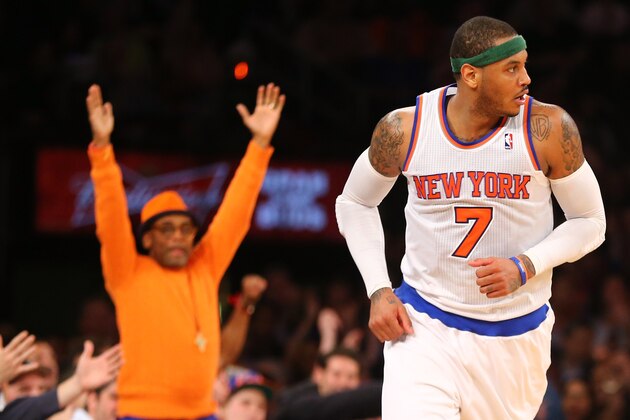 NEW YORK, NY - APRIL 09:  Director Spike Lee celebrates a basket by Carmelo Anthony #7 of the New York Knicks during their game against the Washington Wizards at Madison Square Garden on April 9, 2013 in New York City.  NOTE TO USER: User expressly acknowledges and agrees that, by downloading and or using this photograph, User is consenting to the terms and conditions of the Getty Images License Agreement.  (Photo by Al Bello/Getty Images)