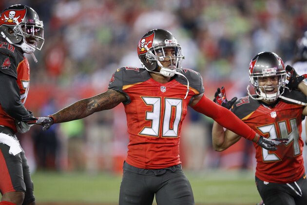 TAMPA, FL - NOVEMBER 27: Bradley McDougald #30 of the Tampa Bay Buccaneers celebrates with teammates after breaking up a pass against the Seattle Seahawks during the game at Raymond James Stadium on November 27, 2016 in Tampa, Florida. The Buccaneers defeated the Seahawks 14-5. (Photo by Joe Robbins/Getty Images)