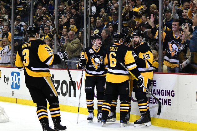 PITTSBURGH, PA - FEBRUARY 03: Nick Bonino #13 of the Pittsburgh Penguins is congratulated by teammates after scoring a goal against the Columbus Blue Jackets at PPG PAINTS Arena on February 3, 2017 in Pittsburgh, Pennsylvania. (Photo by Matt Kincaid/Getty Images)