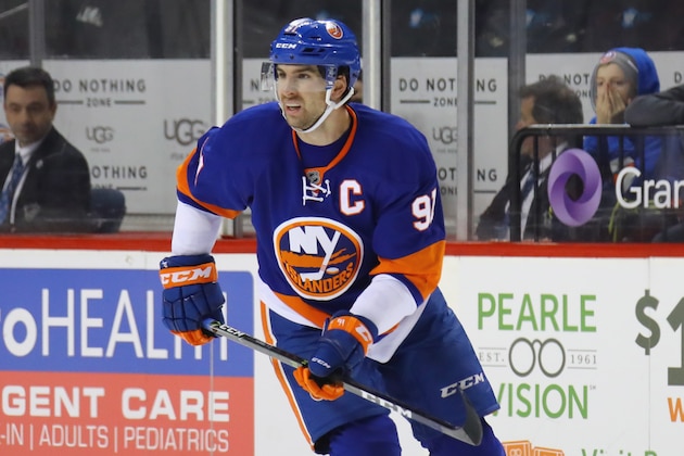 NEW YORK, NY - DECEMBER 13:  John Tavares #91 of the New York Islanders skates against the Washington Capitals at the Barclays Center on December 13, 2016 in the Brooklyn borough of New York City. The Capitals defeated the Islanders 4-2.  (Photo by Bruce Bennett/Getty Images)