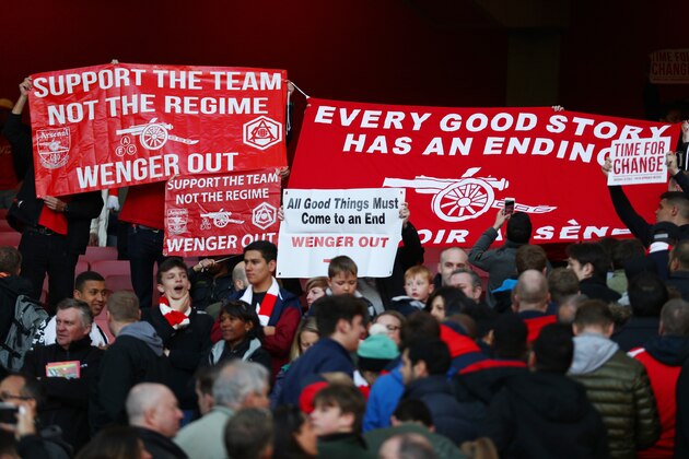 LONDON, ENGLAND - APRIL 30:  Arsenal supporters hold protest banners during the Barclays Premier League match between Arsenal and Norwich City at The Emirates Stadium on April 30, 2016 in London, England  (Photo by Paul Gilham/Getty Images)