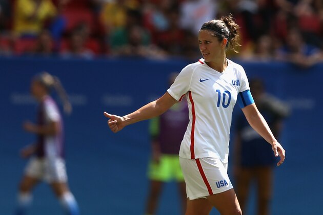 BRASILIA, BRAZIL - AUGUST 12:  Carli Lloyd #10 of United States reacts while playing during the first half against  Sweden during the Women's Football Quarterfinal match at Mane Garrincha Stadium on Day 7 of the Rio 2016 Olympic Games on August 12, 2016 in Brasilia, Brazil.  (Photo by Celso Junior/Getty Images)