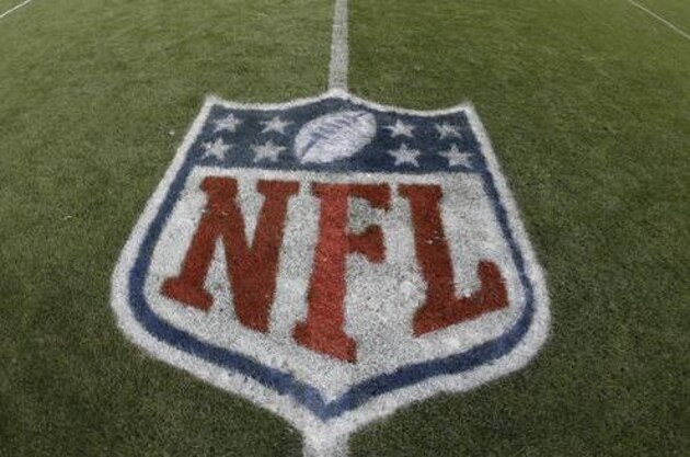The NFL shield logo is shown painted on the field at Sports Authority Field at Mile High before an NFL football game between the Denver Broncos and the Oakland Raiders, Sunday, Jan. 1, 2017, in Denver. (AP Photo/Jack Dempsey)