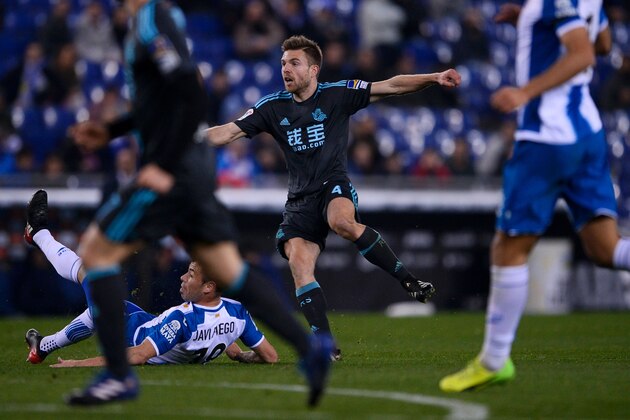 Real Sociedad's midfielder Asier Illarramendi (C) reacts as he scores during the Spanish league football match RCD Espanyol vs Real Sociedad at the RCDE Stadium in Cornella de Llobregat on February 10, 2017. / AFP / Josep Lago        (Photo credit should read JOSEP LAGO/AFP/Getty Images)