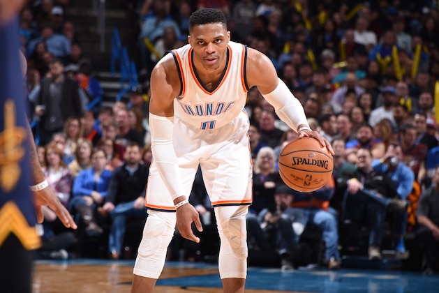 OKLAHOMA CITY, OK - FEBRUARY 9: Russell Westbrook #0 of the Oklahoma City Thunder handles the ball against the Cleveland Cavaliers during the game on February 9, 2017 at Chesapeake Energy Arena in Oklahoma City, Oklahoma. With his 26th triple-double of the season, Westbrook ties Oscar Robertson for the third most triple-doubles in a season. NOTE TO USER: User expressly acknowledges and agrees that, by downloading and or using this photograph, User is consenting to the terms and conditions of the Getty Images License Agreement. Mandatory Copyright Notice: Copyright 2017 NBAE (Photo by Andrew D. Bernstein/NBAE via Getty Images)