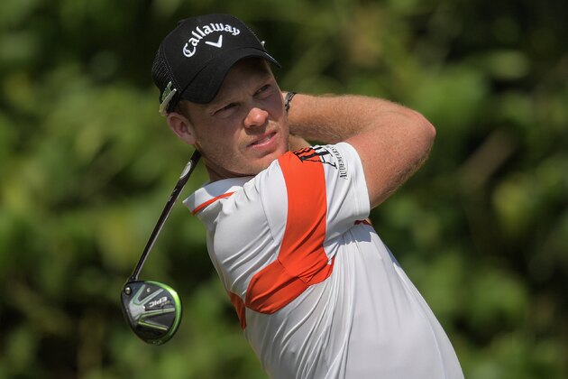 Danny Willett of England watches his shot during the third round of the 2017 Maybank Malaysia Championship golf tournament at Saujana Golf and Country Club outside Kuala Lumpur on February 11, 2017. / AFP / Mohd RASFAN        (Photo credit should read MOHD RASFAN/AFP/Getty Images)