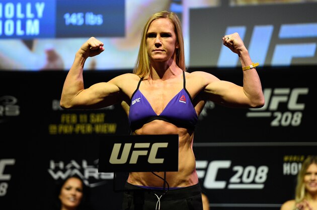 BROOKLYN, NEW YORK - FEBRUARY 10:  Holly Holm poses on the scale during the UFC 208 weigh-in inside Kings Theater on February 10, 2017 in Brooklyn, New York. (Photo by Jeff Bottari/Zuffa LLC/Zuffa LLC via Getty Images)