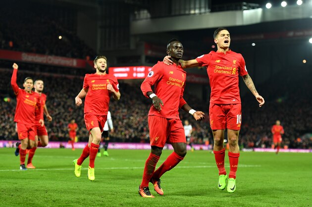 LIVERPOOL, ENGLAND - FEBRUARY 11:  Sadio Mane (2nd R) of Liverpool celebrates scoring his side's second goal with his team mate Philippe Coutinho (1st R) during the Premier League match between Liverpool and Tottenham Hotspur at Anfield on February 11, 2017 in Liverpool, England.  (Photo by Mike Hewitt/Getty Images for Tottenham Hotspur FC)