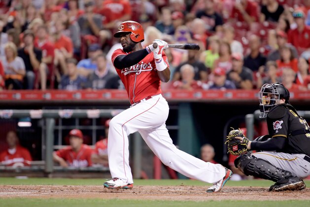 CINCINNATI, OH - SEPTEMBER 16:  Brandon Phillips #4 of the Cincinnati Reds hits a run scoring single in the first inning against the Pittsburgh Pirates at Great American Ball Park on September 16, 2016 in Cincinnati, Ohio.  (Photo by Andy Lyons/Getty Images)