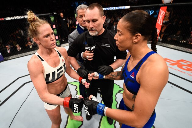 BROOKLYN, NEW YORK - FEBRUARY 11:  (L-R) Holly Holm and Germaine de Randamie of The Netherlands touch gloves in their women's featherweight championship bout during the UFC 208 event inside Barclays Center on February 11, 2017 in Brooklyn, New York. (Photo by Jeff Bottari/Zuffa LLC/Zuffa LLC via Getty Images)