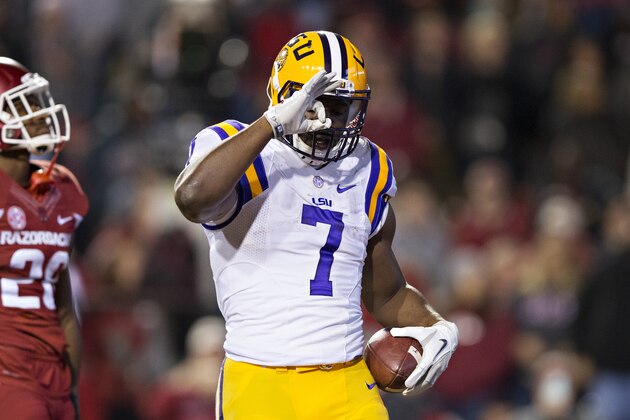 FAYETTEVILLE, AR - NOVEMBER 12:  Leonard Fournette #7 of the LSU Tigers celebrates after scoring a touchdown during a game against the Arkansas Razorbacks at Razorback Stadium on November 12, 2016 in Fayetteville, Arkansas.  The Tigers defeated the Razorbacks 38-10.  (Photo by Wesley Hitt/Getty Images)