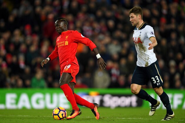 LIVERPOOL, ENGLAND - FEBRUARY 11: Sadio Mane of Liverpool runs with the ball to score the opening goal during the Premier League match between Liverpool and Tottenham Hotspur at Anfield on February 11, 2017 in Liverpool, England.  (Photo by Mike Hewitt/Getty Images for Tottenham Hotspur FC)