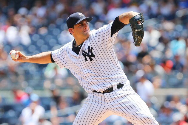 NEW YORK, NY - JULY 24:  Nathan Eovaldi #30 of the New York Yankees pitches in the first inning against the San Francisco Giants at Yankee Stadium on July 24, 2016 in the Bronx borough of New York City.  (Photo by Mike Stobe/Getty Images)