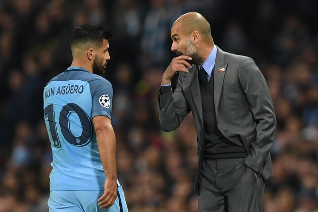 MANCHESTER, ENGLAND - NOVEMBER 01: Josep Guardiola manager of Manchester City (R) gives Sergio Aguero of Manchester City (L) instructions during the UEFA Champions League Group C match between Manchester City FC and FC Barcelona at Etihad Stadium on November 1, 2016 in Manchester, England.  (Photo by Shaun Botterill/Getty Images)